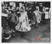 The sandwich men wearing costumes based on sketches by Ivan Puni. The parade through the streets in Berlin during the opening of the exhibition at the gallery Der Sturm. 1922 The sandwich men wearing costumes based on sketches by Ivan Puni.