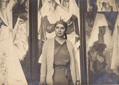 Н.С. Гончарова в мастерской на фоне полиптиха «Испанки» и картины «Две испанки». [Середина 1920-х – 1930-е]. Фотография