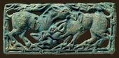 Пряжка ремня с дерущимися жеребцами. II век до н.э. Южная Сибирь